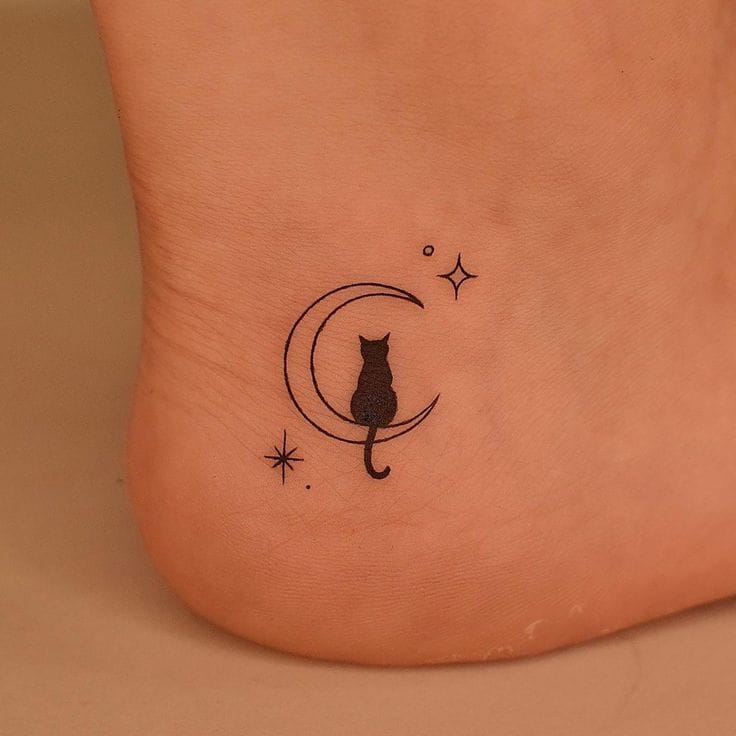 Meanings of Small Tattoo Ideas and Where to Get Them 11 Small Cat Moon Tattoo