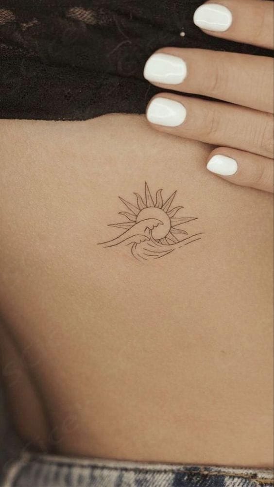 Meanings of Small Tattoo Ideas and Where to Get Them 20 tattoo of the sun and ocean waves