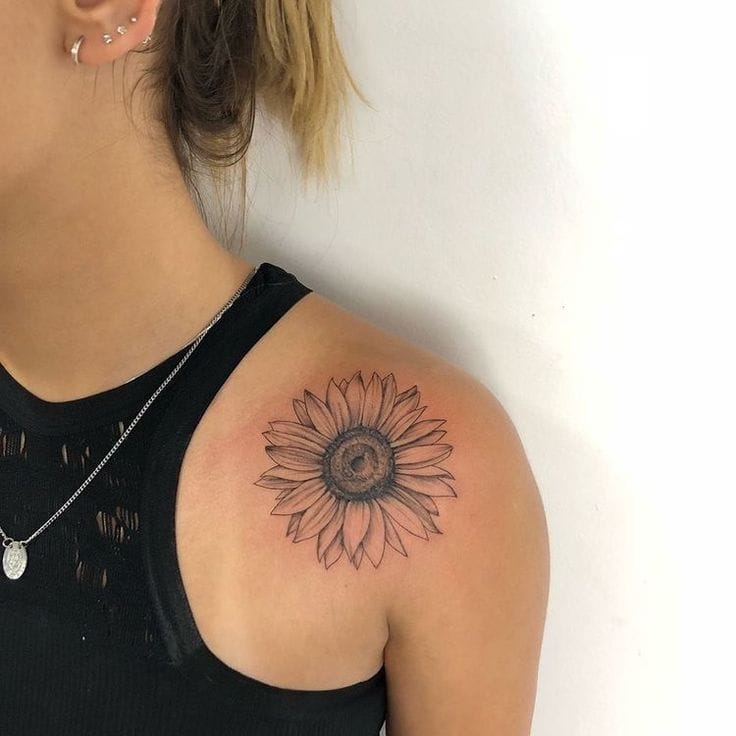 Sunflower Tattoo Meaning, Designs & Placement Ideas 5 Detailed geometric sunflower tattoo design