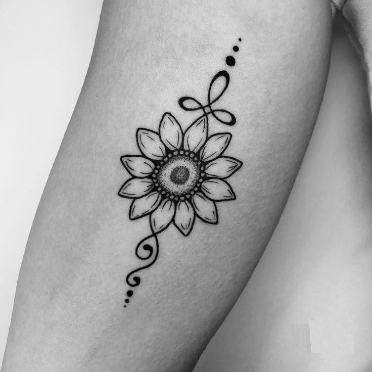 Sunflower Tattoo Meaning, Designs & Placement Ideas 6 Sunflower design combined with an unalome-style line